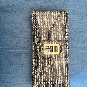 Rebecca Minkoff Chic Black and Gold Clutch